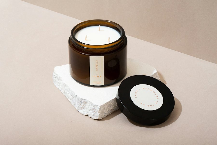 Amber glass candle on a marble block