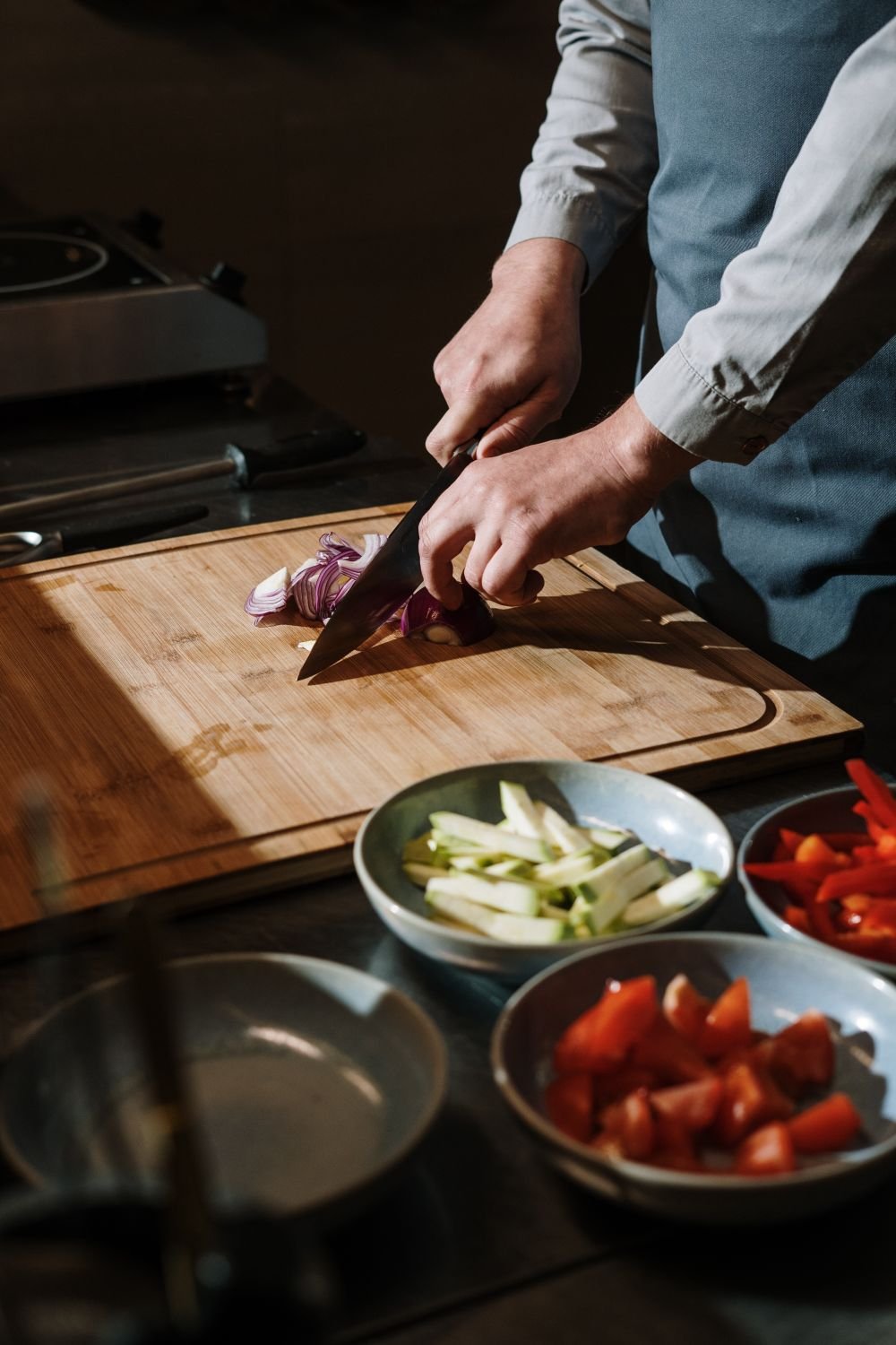 Photograph of a chef preparing fresh ingredients