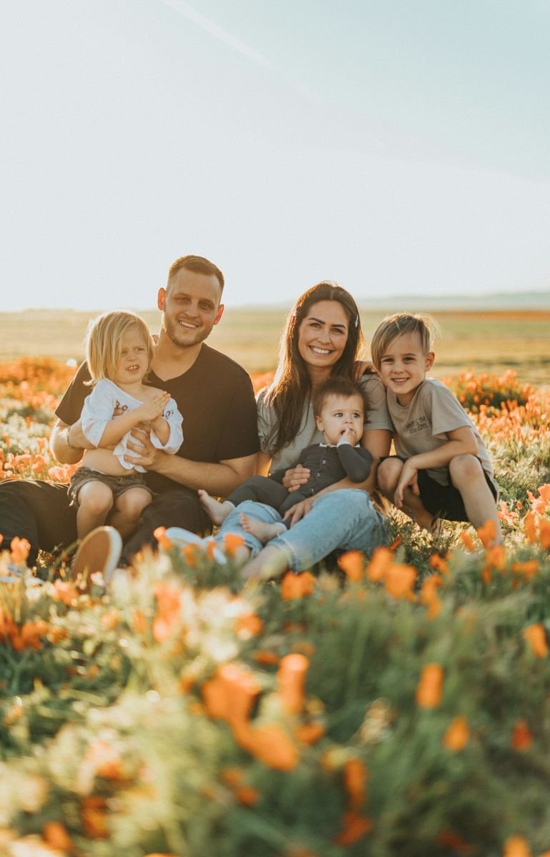 Family photoshoot in a flower field