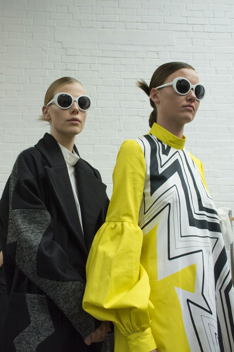 Two models in bold fashion looks