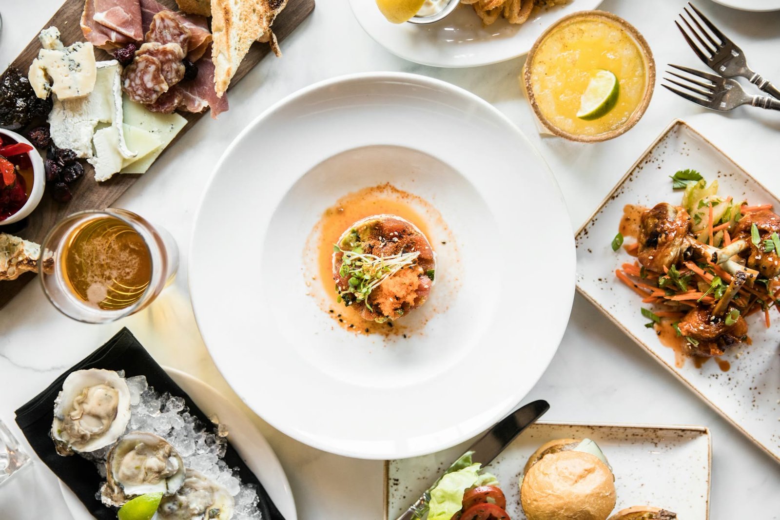 Fine dining dishes on a restaurant table from above