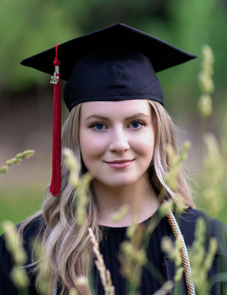 Graduation portrait in cap and gown