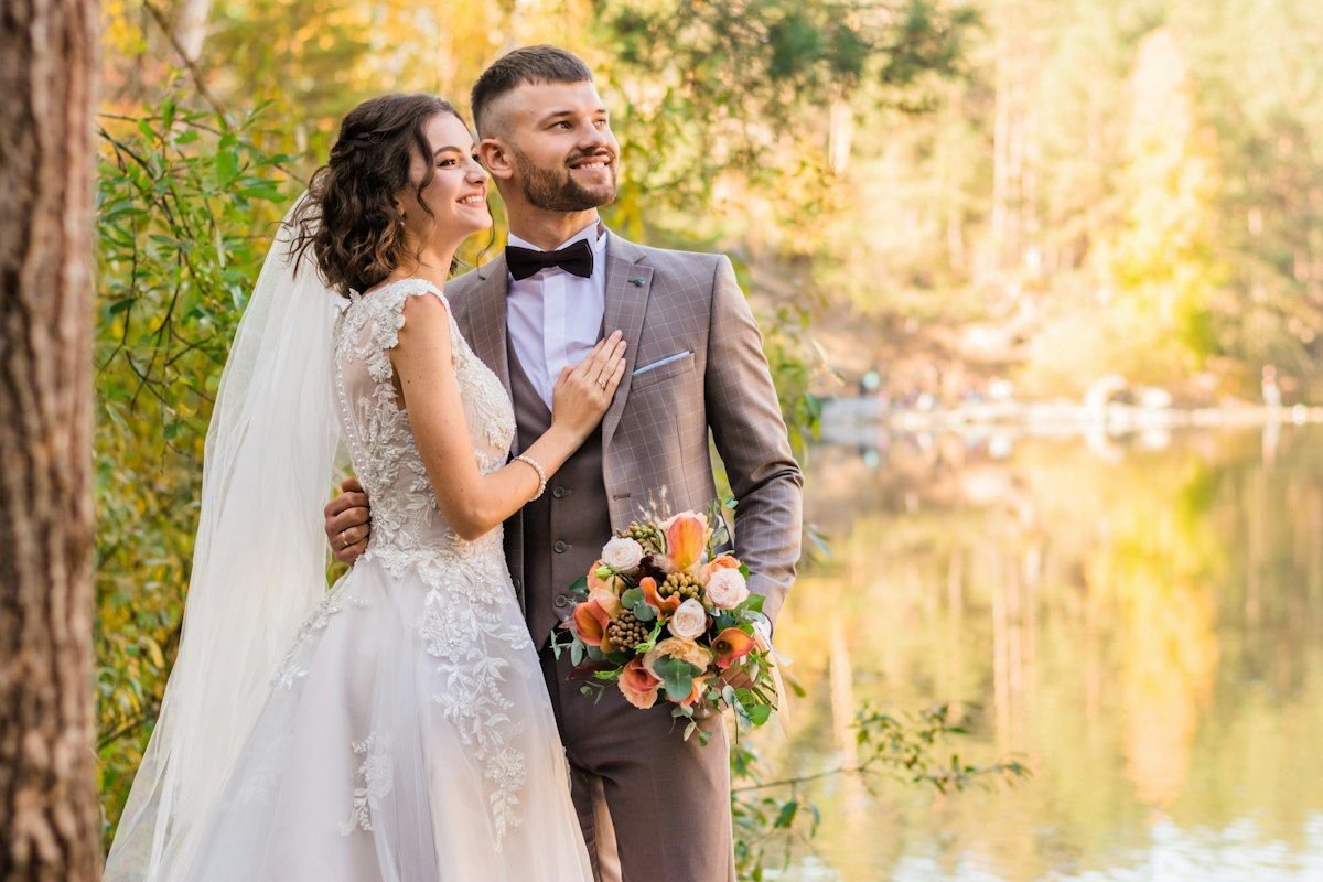 Bride and groom with her bouquet